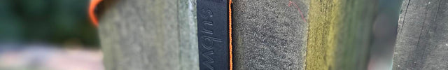 orange-striped-longline-on-a-fence-post