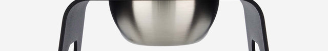 subwooferdog-profile-view-of-black-elevated-pet-stand-and-stainless-steel-bowl