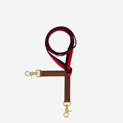 subwooferdog-clearcut-view-from-above-of-red-and-navy-stripe-dog-leash-with-tan-leather-and-brass-swivel-hooks
